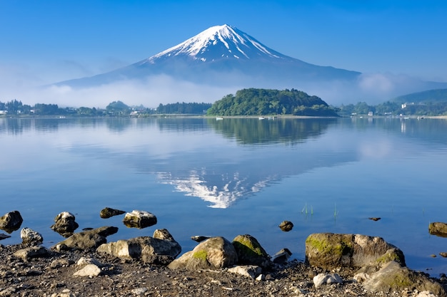 Reflection of Mt. Fuji with rock shore foreground, Kawaguchiko lake, Yamanashi