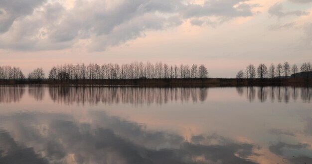 reflection of the sky in the lake at sunset