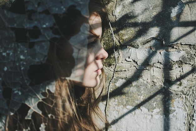 Photo reflection of woman seen in side