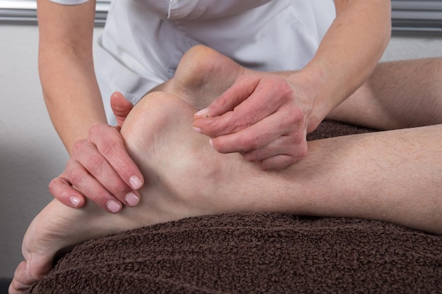 The reflexology foot massage at health center