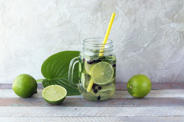 Refreshing drink from organic fruits, berries and cucumbers, mint leaves in glass cups