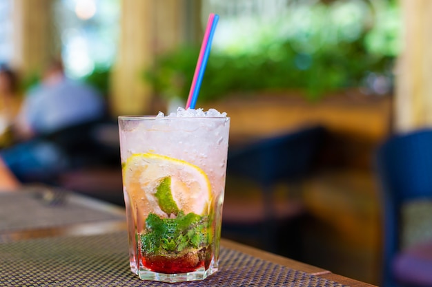 Refreshing mojito with crushed ice on a hot summer day