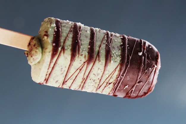 Refreshing Popsicle with mints and chocolate,mints ice cream with chocolate dip stick.