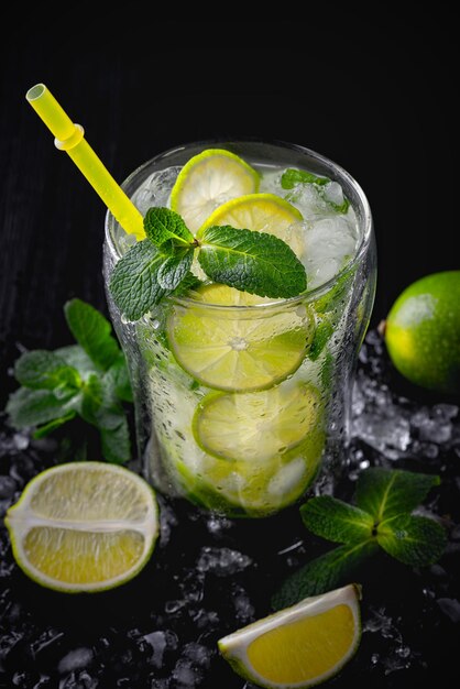 Refreshing summer alcoholic cocktail mojito with ice fresh mint and lime Copy Space