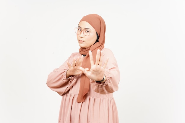 Rejection hand gesture of Beautiful Asian Woman Wearing Hijab Isolated On White Background