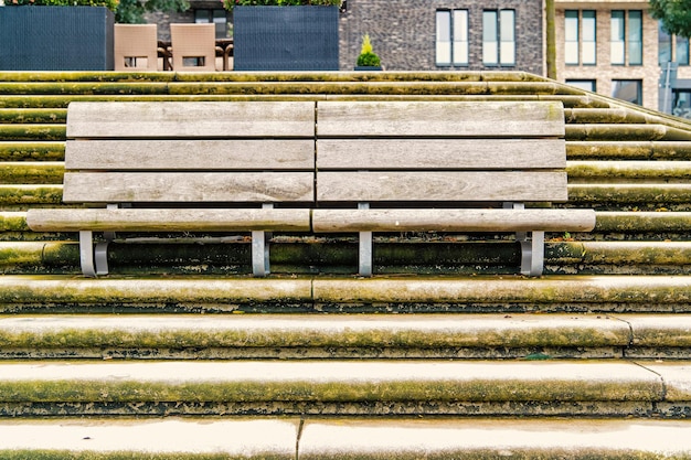 Relax, rest, seat, outdoor furniture in Hamburg, Germany. Benches on stone stairs. Architecture, structure, design style Perspective shape symmetry geometry new technologgy