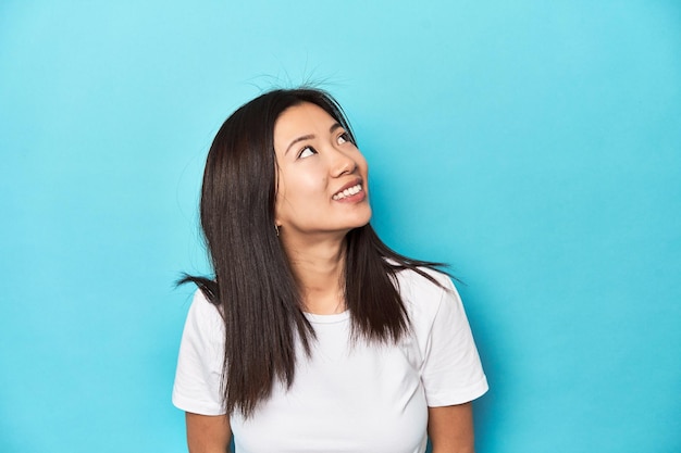 Relaxed and happy laughing neck stretched showing teeth