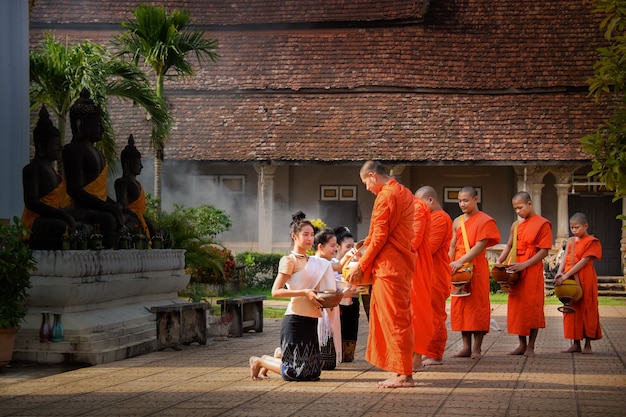 Religious activities of Laos men and girls. 21/8/59 Luang Prabang, Laos