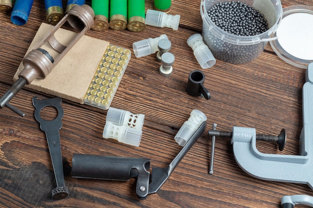 Reloading process shotgun shells with special reload equipment. 