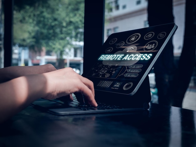 Remote access technology connection via internet on cloud storage for collaboration work with remote team Management icons with digital data on tablet screen and hands working on secure network
