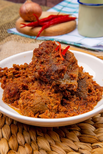 Rendang Pork or Rendang babi 

Rendang babi is often described as a rich dish of meat  that has been slow cooked and braised in a coconut milk seasoned with a herb and spice mixture