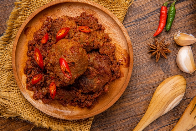 Rendang Pork or Rendang babi 

Rendang babi is often described as a rich dish of meat  that has been slow cooked and braised in a coconut milk seasoned with a herb and spice mixture