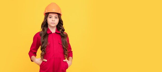 Renovation child on construction site improve your childhood future engineer making repairs Child builder in helmet horizontal poster design Banner header copy space