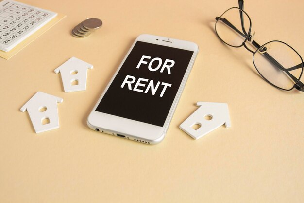 Photo for rent symbol symbol concept words for rent written on the mobile phone screen