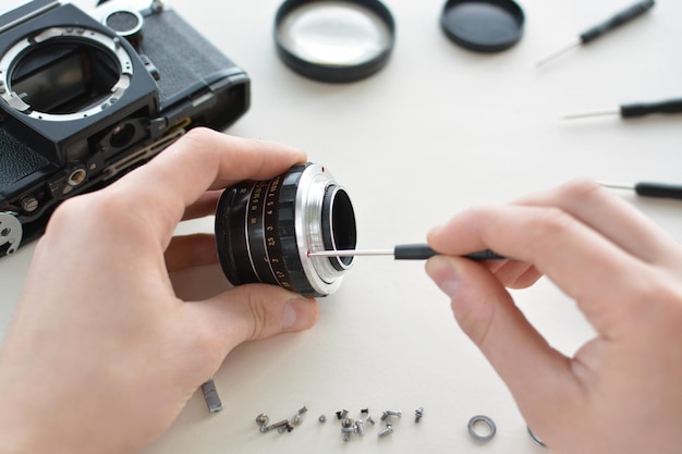 Repair manual camera lens