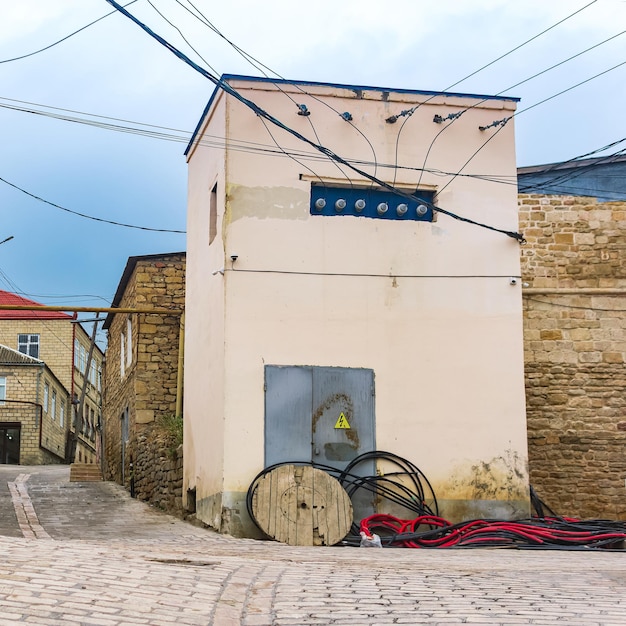 Repair of a transformer box in a historic area with old houses