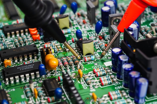 Repairing electronic equipment with equipment by an engineer. test electronic equipment technology.