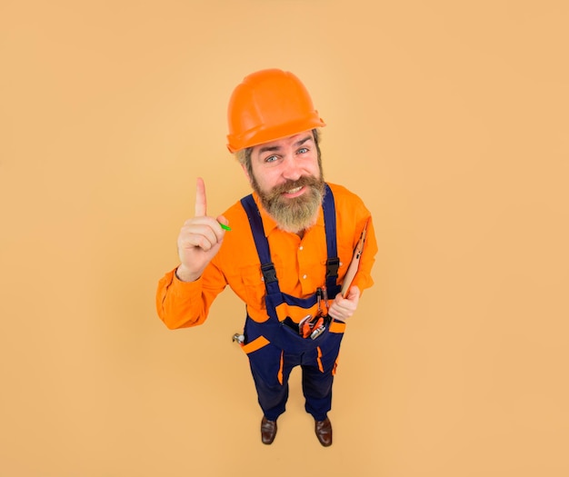 Repairman in full height business building industry technology builder concept builder in hard hat