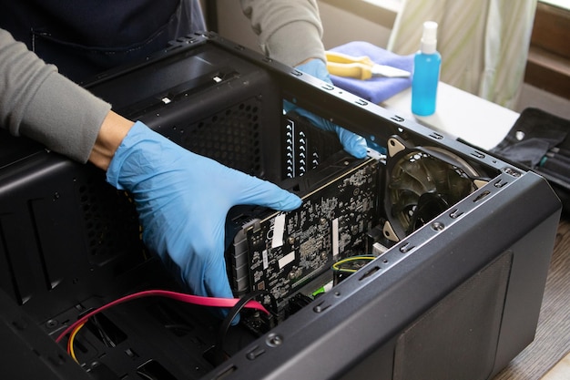 Repairman repairing computer Computer maintenance Copy space