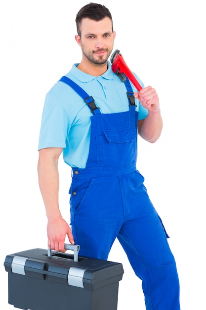 Repairman with toolbox and monkey wrench 