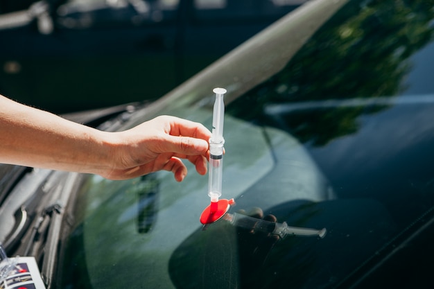 Repairment of the windshield of a car