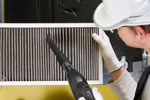 Replacing filter in the central ventilation system hvac filter replacing home central air system