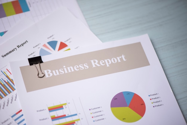 Photo report paper document present financial and business report graph chart on office table