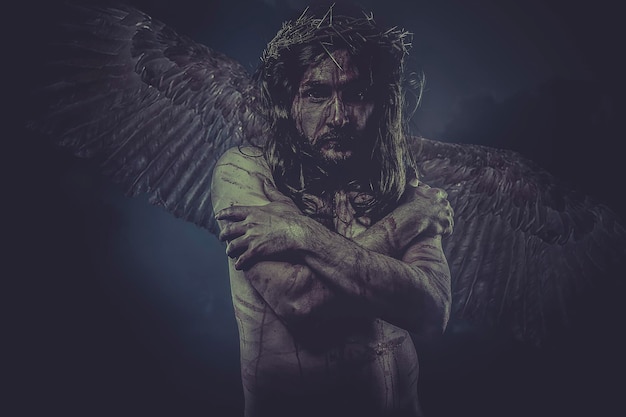 representation of jesus with wings and crown of thorns