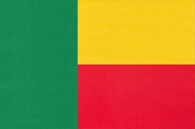 Republic Benin national fabric flag textile background. Symbol of world african country.