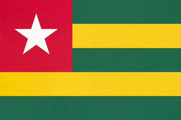 Republic Togolese national fabric flag textile background. Symbol of world african country.