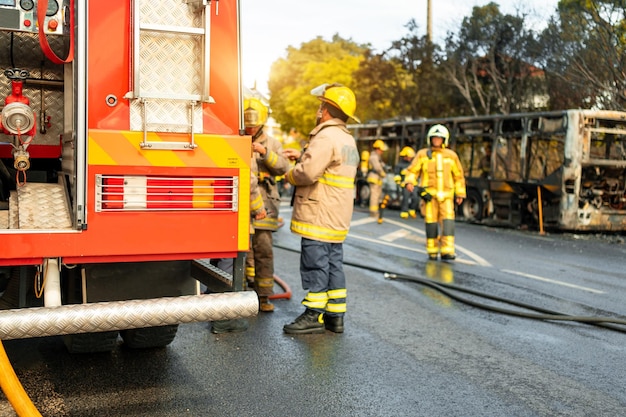 Rescue Team of Firefighters Arrive on the Car Crash