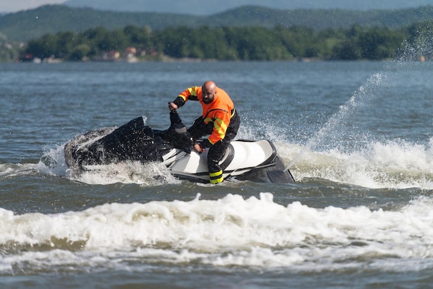 Rescuer Searching Lake Area by Atv Jet Ski