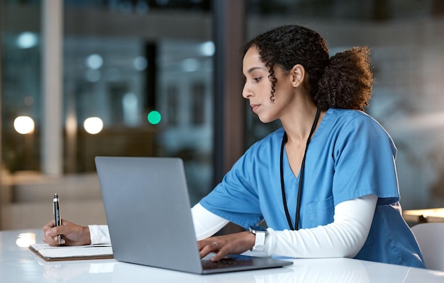 Research writing and doctor black woman with notebook for medical report healthcare and schedule in hospital Medicine clinic and nurse write notes for prescription insurance and consultation