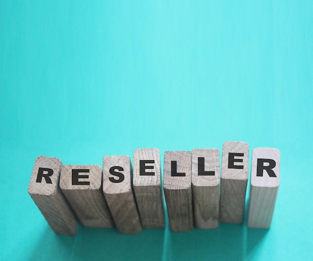 Photo reseller word made with building blocks trading reselling retail business concept