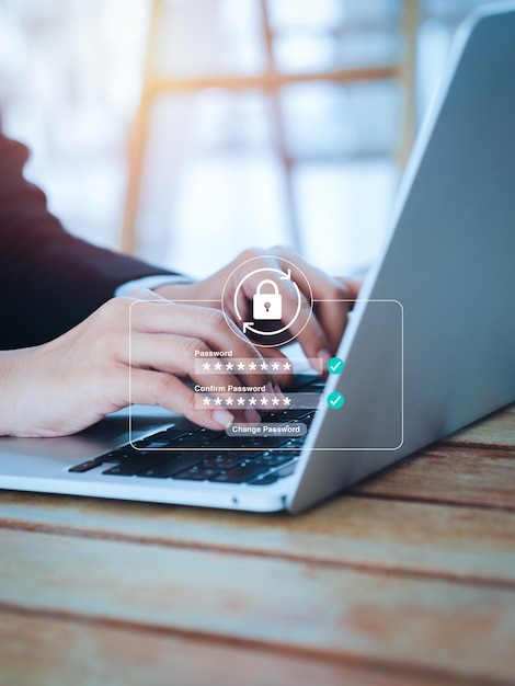 Reset password concept Lock icon security code showing on change password page while business person using laptop computer vertical style Cyber security technology on website for data protection