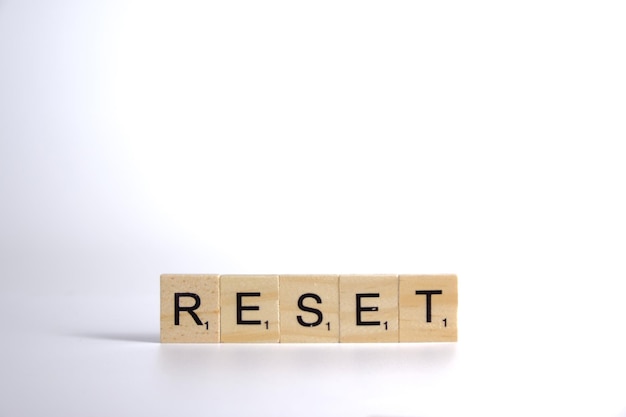 Reset word written on wood block