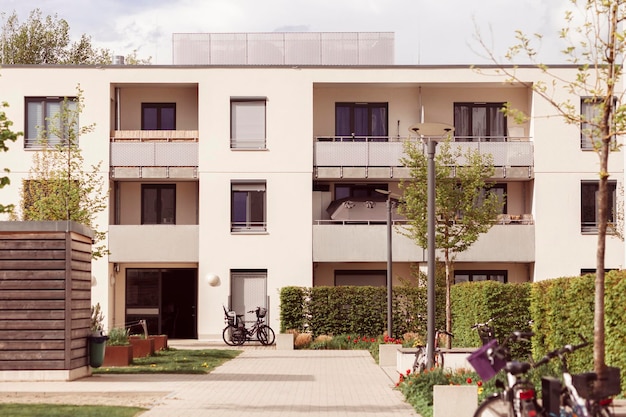 Residential Apartment Buildings in Germany. Modern block of Flats. Courtyard, Bikes Road, Terrace