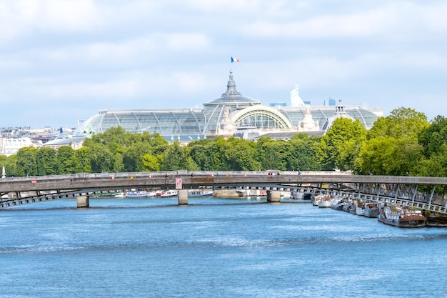 Residential Barges on the Banks of the Seine and Grand Palace Roofs