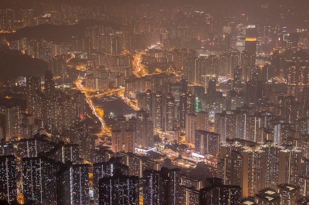 Residential Buildings in Hong Kong at Night. Panoramic Aerial View.