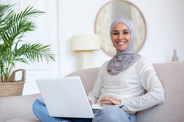 Rest at home leisure time portrait of a young arab woman in a hijab spending time at home on the