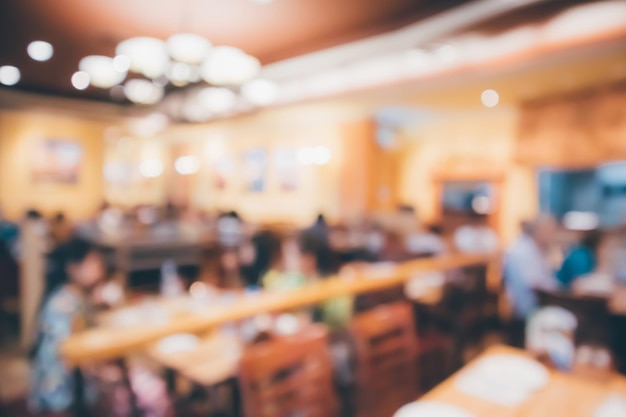 Restaurant cafe or coffee shop interior with people abstract defocused blur background