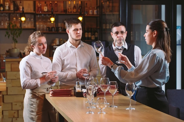 The restaurant staff learns to distinguish between glasses.