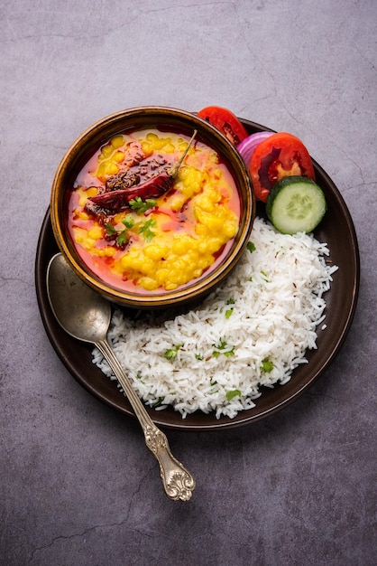 Restaurant style Dal Tadka tempered with ghee and spices! This recipe makes a great meal with boiled rice