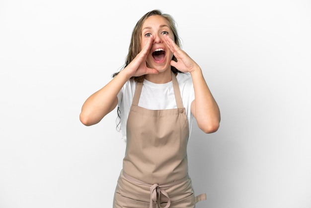 Restaurant waiter caucasian woman isolated on white background shouting and announcing something