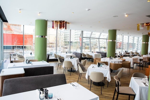 Restaurant and white table with Empty glasses set in restaurant catering food table