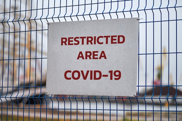 Restricted area sign, coronavirus quarantine zone message