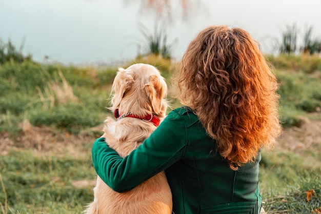 Retriever dog receives a reward for obedience