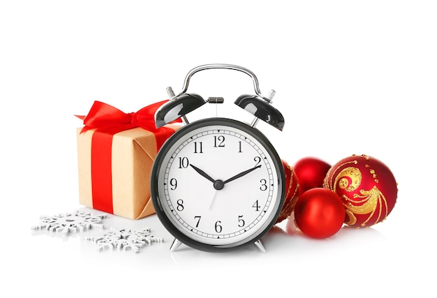 Retro alarm clock, decorations and gift box. Christmas countdown concept