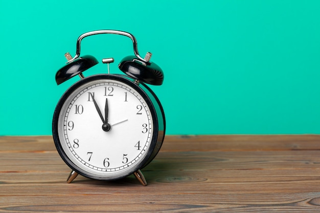 retro alarm clock on table