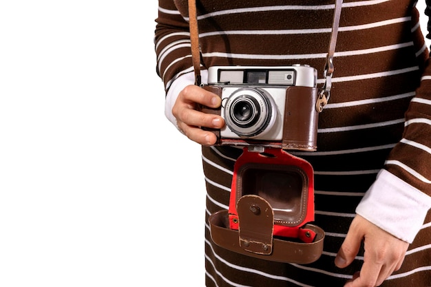 Photo retro camera used by young woman